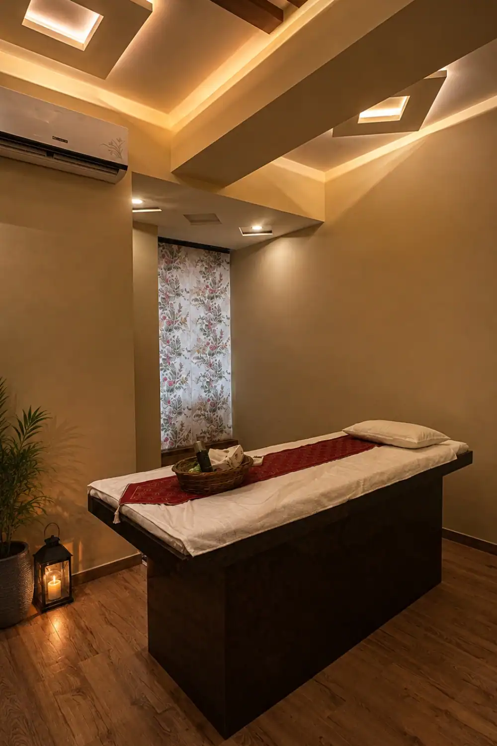 Private air-conditioned massage suite with fresh linen, Surat
